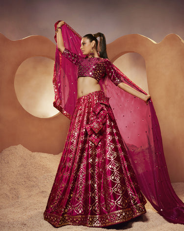 Magenta Colour Bridal Sequince Embroidered with all Over Mirror Work Lehenga Choli 1