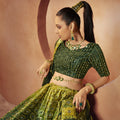 reen Colour Bridal Special Function Sequince Embroidered with all over mirror work Lehenga Choli 1
