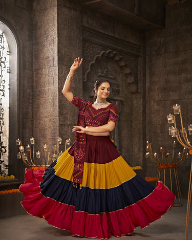 Maroon Traditional Lehenga choli features exquisite Navratri thread work and intricate mirror embroidery Choli 