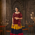 Maroon Traditional Lehenga choli features exquisite Navratri thread work and intricate mirror embroidery Choli 1