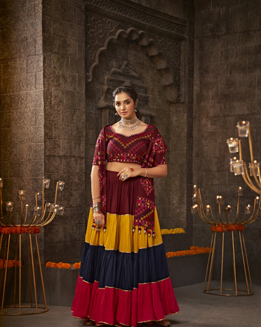 Maroon Traditional Lehenga choli features exquisite Navratri thread work and intricate mirror embroidery Choli 1