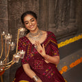 Maroon Traditional Lehenga choli features exquisite Navratri thread work and intricate mirror embroidery Choli 3