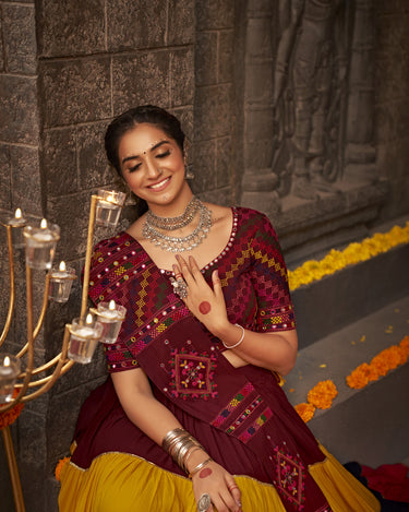 Maroon Traditional Lehenga choli features exquisite Navratri thread work and intricate mirror embroidery Choli 3