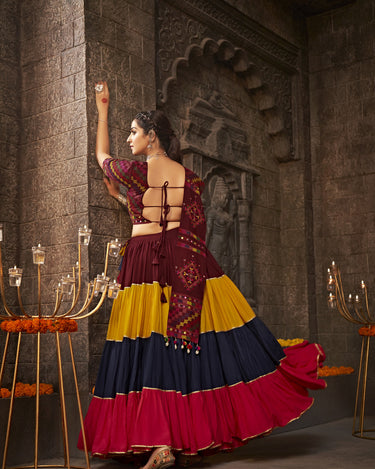 Maroon Traditional Lehenga choli features exquisite Navratri thread work and intricate mirror embroidery Choli 4